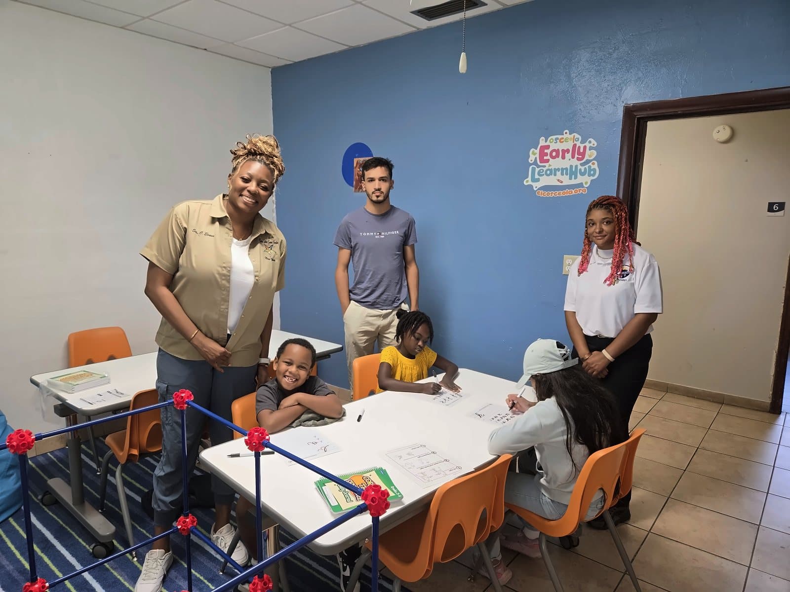 SWREA students at their table with Ms. Jayla and staff on the first day of school