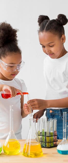 Two students conducting a science experiment